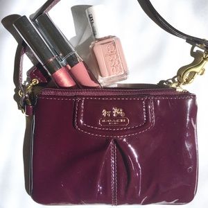 Plum Purple Coach Wristlet